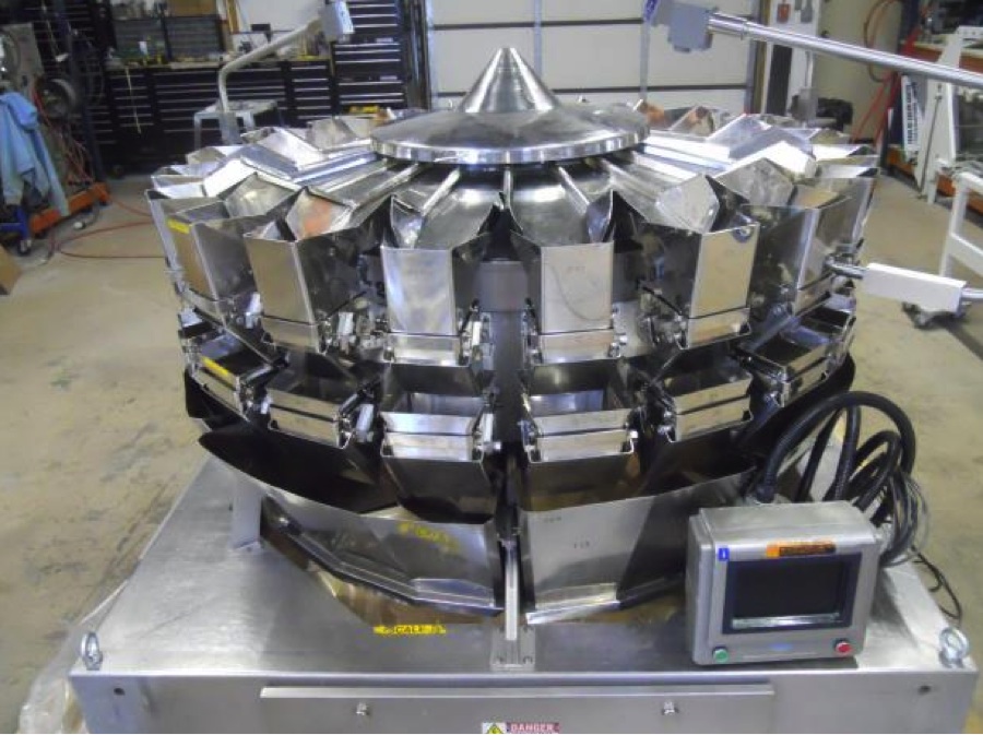 HP Packaging Provides Tech Support for Used Packaging Machines Like This Combination Weigher