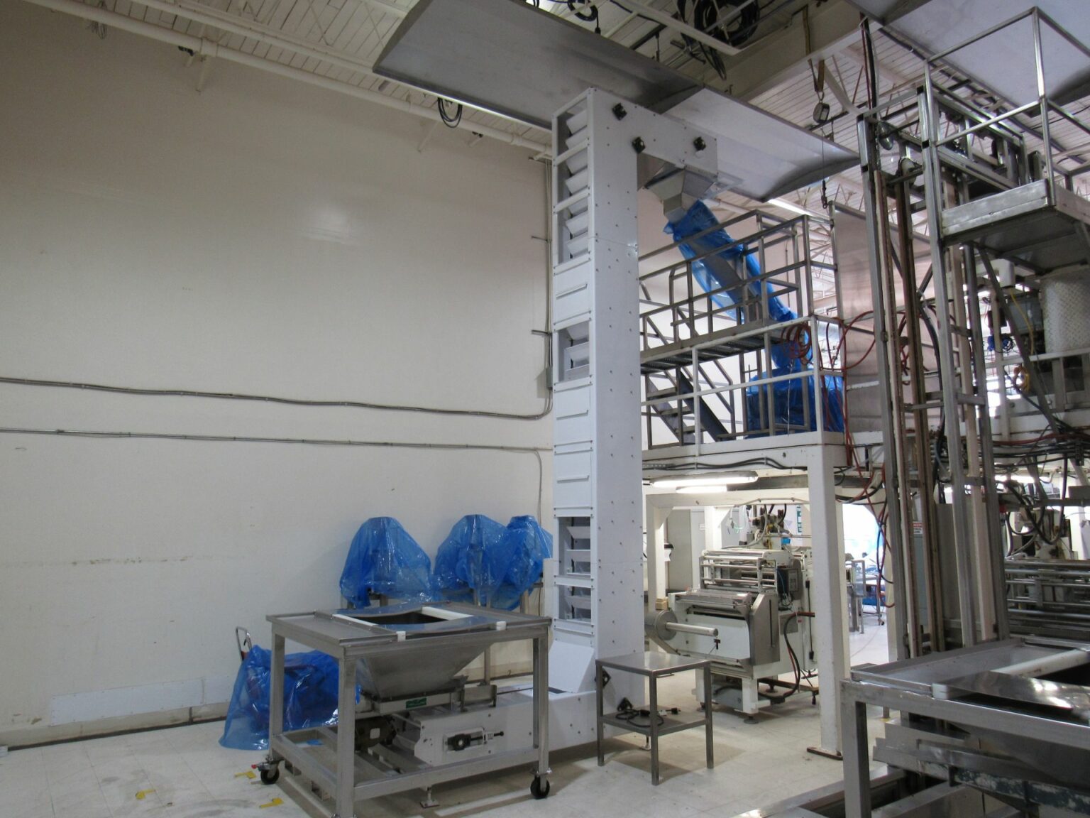 Frazier and Son Z-shape bucket elevator - High Performance Packaging